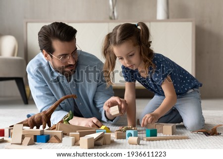 Image, Stock Photo Small girls building toy construction machine