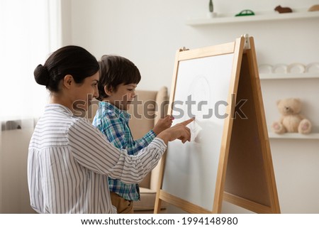 Similar – Image, Stock Photo Mother and son playing inside a cardboard box