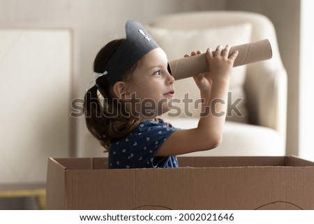 Similar – Image, Stock Photo Little Caucasian Girl in costume of which orange and black color and celebrating Halloween outdoor