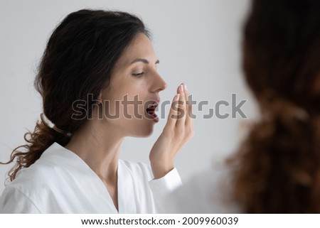 Similar – Image, Stock Photo Woman closing opening self storage door