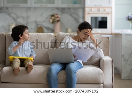 Similar – Image, Stock Photo Tired kid browsing laptop at home