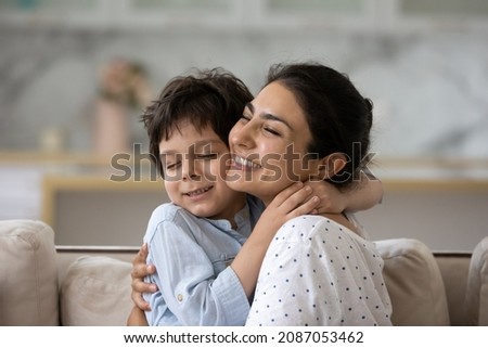 Similar – Image, Stock Photo young mother and happy baby using mobile phone outdoors. technology concept