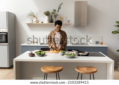 Similar – Image, Stock Photo Black woman enjoying fries and burger in restaurant