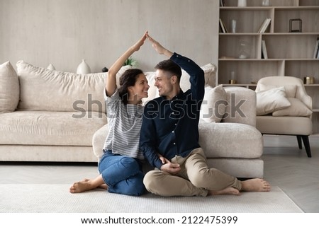 Similar – Image, Stock Photo Loving couple sitting on car on road near forest