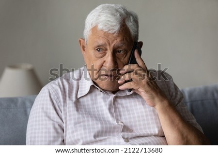 Similar – Image, Stock Photo Doctor making a phone call. Hospital staff working at night duty. Woman wearing uniform, cap and face mask to prevent virus infection