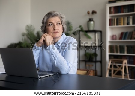 Similar – Image, Stock Photo Senior lady looking away from boardwalk