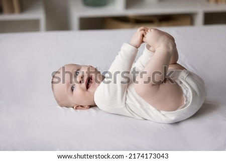 Similar – Foto Bild Süßes Baby im Korb liegend, Ansicht von oben.