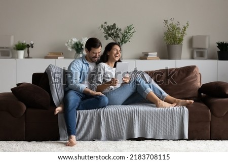 Similar – Image, Stock Photo Woman with joy pad sitting in dark room