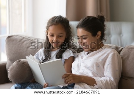 Similar – Image, Stock Photo Woman and kid holding hands on a meadow