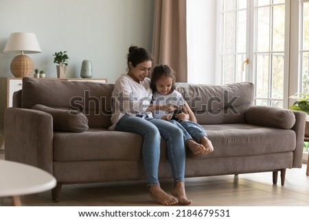 Similar – Image, Stock Photo Content mother playing with child in bedroom