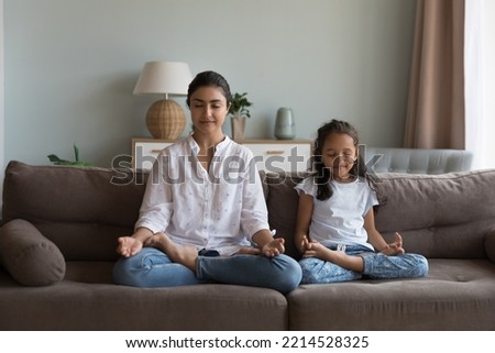 Similar – Image, Stock Photo Women practicing yoga together on rooftop