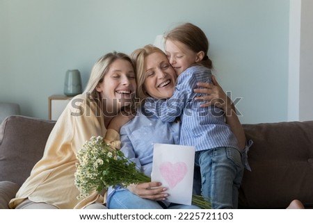 Similar – Foto Bild Frau mit Blume auf einem Pflaster