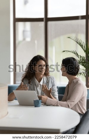 Similar – Image, Stock Photo Cheerful female manager speaking on smartphone on street