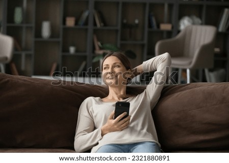 Similar – Image, Stock Photo Serene woman relaxing in gym