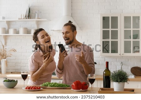 Similar – Image, Stock Photo Two women listening to music