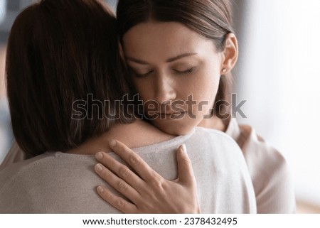 Similar – Image, Stock Photo Tender mother embracing sad son