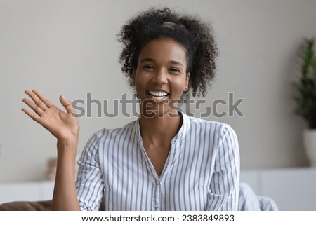 Similar – Image, Stock Photo Young woman making video call sending greetings from vacation trip in mountains. Woman with backpack hiking through tall grass along path on meadow