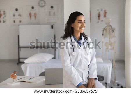 Similar – Image, Stock Photo Female doctor looking out the hospital window