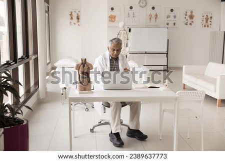 Similar – Image, Stock Photo doctor man indoors, using mobile phone. Wearing protective gloves, mask and stethoscope. coronavirus covid-19 concept