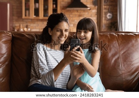 Similar – Image, Stock Photo Women making video call on mobile phone.  Taking selfie photo using smartphone