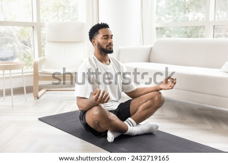 Similar – Image, Stock Photo Man doing yoga by the beach