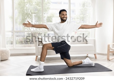 Similar – Image, Stock Photo Strong man doing yoga on beautiful ocean beach