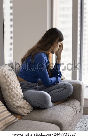 Similar – Image, Stock Photo thoughtful woman leaning on wall