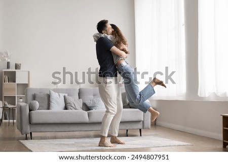 Image, Stock Photo Happy newlywed couple hugging on beach