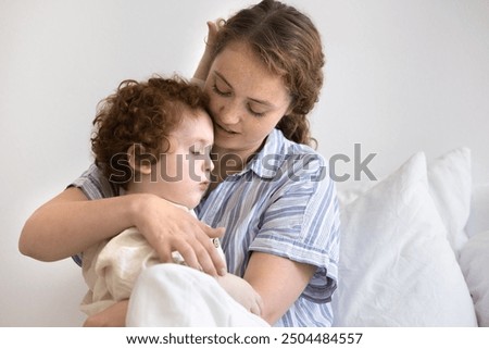 Similar – Image, Stock Photo Child kindly caresses his dog