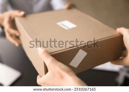 Similar – Image, Stock Photo Woman closing cardboard boxes with seal tape