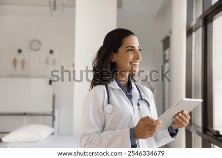 Similar – Image, Stock Photo doctor woman indoors, using mobile phone. Wearing protective gloves, mask and stethoscope. coronavirus covid-19 concept