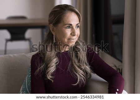 Similar – Image, Stock Photo Relaxed woman in trendy outfit and hat in autumn park