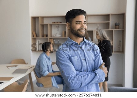 Similar – Image, Stock Photo Self assured young ethnic woman strolling on street in sunlight