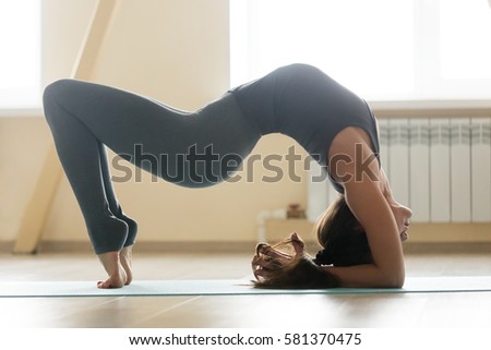 Similar – Foto Bild urdhva dhanurasana.foto des Mädchens beim Yoga am Pool in einem Ferienort