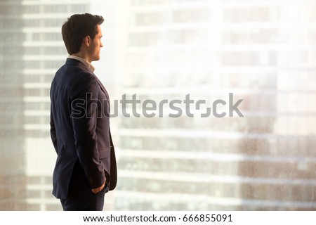 Thoughtful businessman looking at city standing near window, successful entrepreneur considering new opportunity, thinking over business improvement, ways to overcome obstacles, side view, copy space  ストックフォト © 