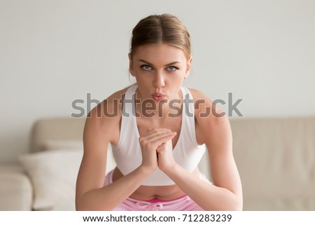 Similar – Image, Stock Photo Crouched woman looking at camera