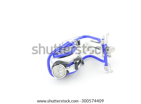 difference position mini scooter made from white, black and blue wire isolated white background