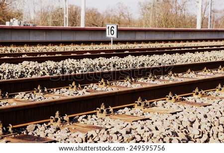 Rail track view with the plate '16'