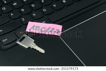 Internet security: Lock key and easy, weak password on the sticky note