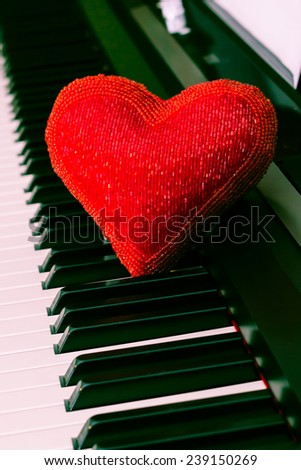 Red heart aver piano keyboard