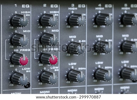 Control of sound levels on a mixer. Amplifier