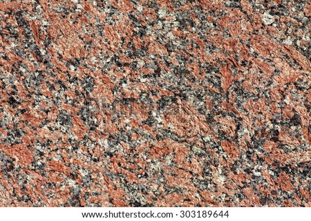 Red granite tile texture close up photo design pattern
