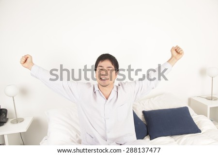 Man stretching after wake up