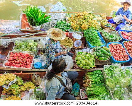 BANGKOK - JUNE,2 : The boats are full of fruits and vegetables that seller are join at floating market named \