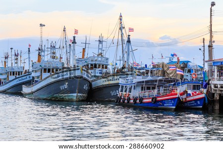 SATTAHEEP CHONBURI - JUNE,19 : The group of fishing boats are mooring at the old port. They are waiting for go out when the wind coming. This is the nice view of fishing villages.THAILAND JUNE,19 2015