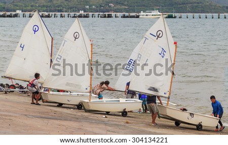 SATTAHEEP CHONBURI - AUGUST,8 : The group of sailing boats are pullinging up at the old port. After They practice for next completition. This is the nice view of sailing clubs.THAILAND AUGUST,8 2015