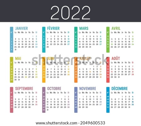 Colorful year 2022 calendar, with weeks numbers, in French language, isolated on a white background. Vector template.