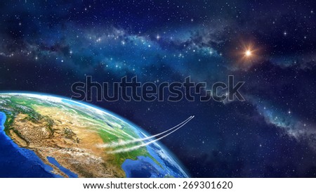 Space travel. Very high definition picture of planet earth in outer space. Spacecrafts lifting off from USA soil. Elements of this image furnished by NASA