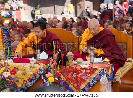 Nepal, Kathmandu,  Boudhanath stupa -17th of December 2013: meditation of Tibetan Buddhist Monks during festival