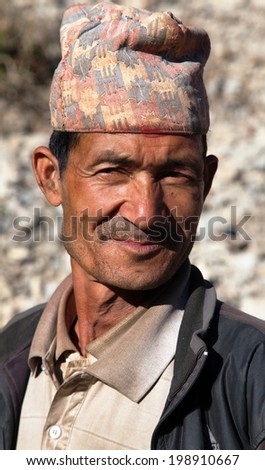 DDOGADI VILLAGE, WESTERN NEPAL, 30TH NOVEMBER 2013 - Nepal man with typical nepali hat on head